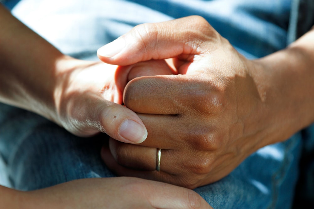 Caring hands held together